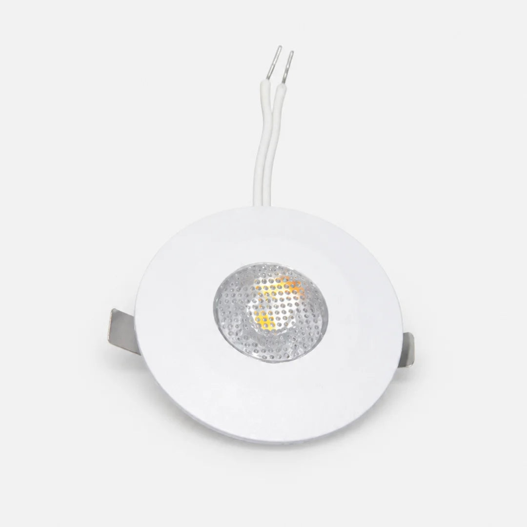 White LED downlight on a light gray background