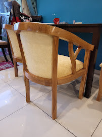 Customer photo: teak armchair in their home