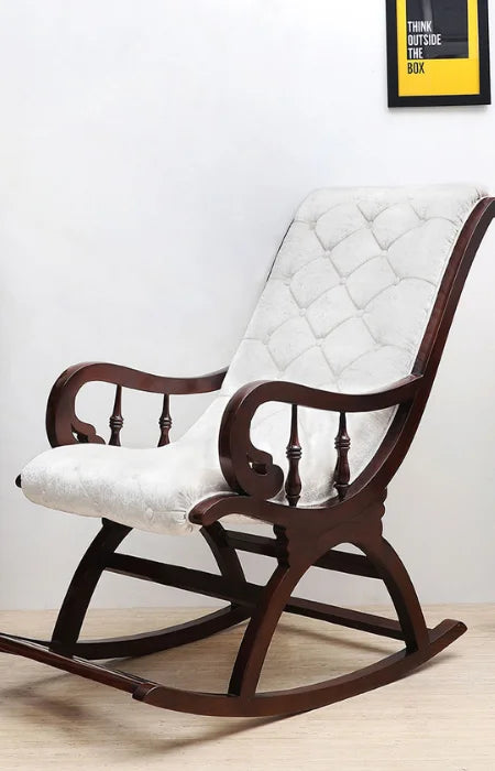 Touffy Fabric Upholstered Teak Wood Rocking Chair in a living room.