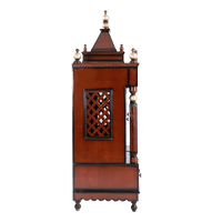 Antarusya Large Floor Rested Pooja Mandir/Wooden temple with Door for home in Brown Gold color side view featuring jali design and Pillars