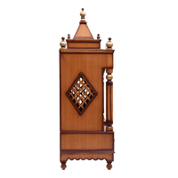 Pooja Graham Large Floor Rested Pooja Mandir/Wooden temple with doors for home in Teak Gold color side view featuring jali design and Pillars