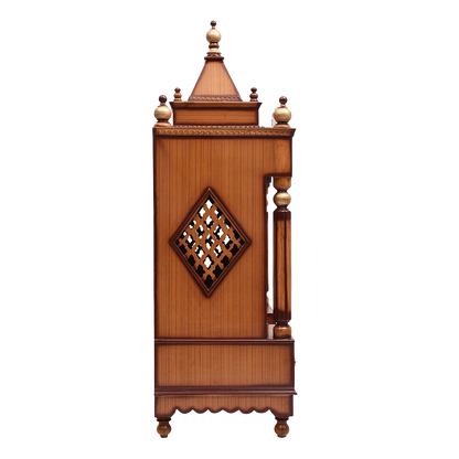 Pooja Graham Large Floor Rested Pooja Mandir/Wooden temple with doors for home in Teak Gold color side view featuring jali design and Pillars