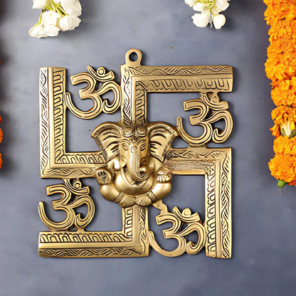 Swastik Ganesha Brass Wall Hanging with Om Symbols lifestyle view