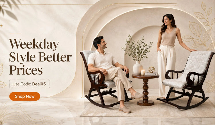 Couple sitting in wooden rocking chairs with a decorative coffee table between them