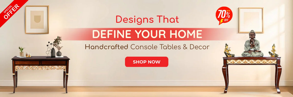Special offer banner showcasing handcrafted console tables with lamps and decor on a beige background wall. Text reads "Designs That Define Your Home, Handcrafted Console Tables & Décor" with up to 70% off and a red "Shop Now" button.
