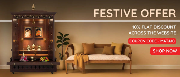 Wooden pooja mandir with idols and wooden loveseat sofa with cushions, festive banner offering 10% flat discount across website with coupon code MATA10.
