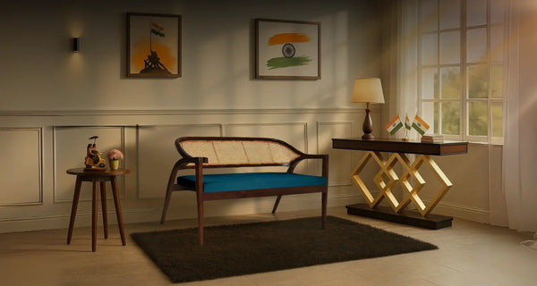 Living room with a love seat, side table, and wall decorations.