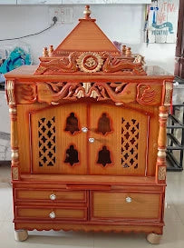 Teak colour floor rested pooja mandir in a customer's home