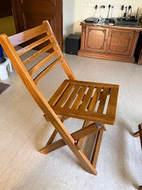 Customer photo: teak folding chair in their home